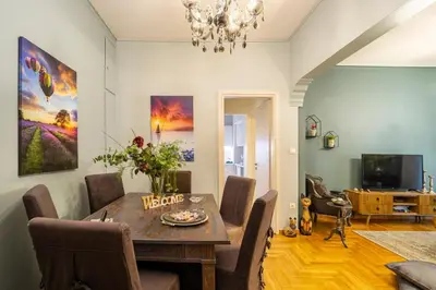 a dining room with a table and chairs at Little house in the city in Athens