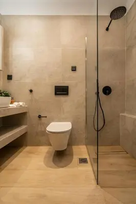 a bathroom with a toilet and a shower at Mini Sinatra Suite Syntagma in Athens