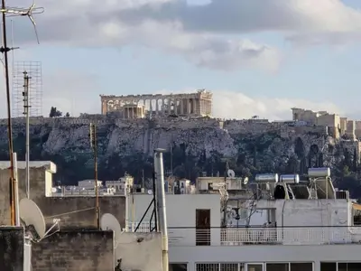 a view of the acropolis of athens from a building at Nektaria philoxenia place in Athens