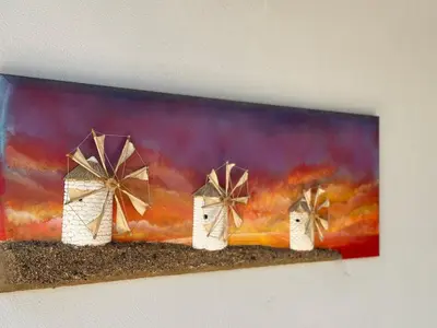a painting of three windmills on a wall at LoftLiving cozy in Athens