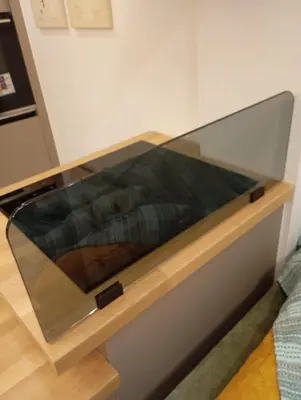 a glass display case on a shelf in a room at Stylish & Cozy 1 BR in Lycabetus in Athens