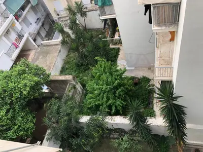 an aerial view of a building with trees and plants at cozy smart house in Athens