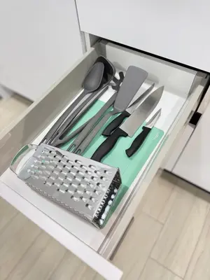 a drawer with a keyboard and other kitchen utensils at City Vibes Athens in Athens