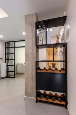 a display case in a room with a wall at Modern Stay in Athens Center in Athens