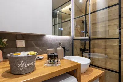 a bathroom with a sink and a toilet and a shower at Modern Stay in Athens Center in Athens