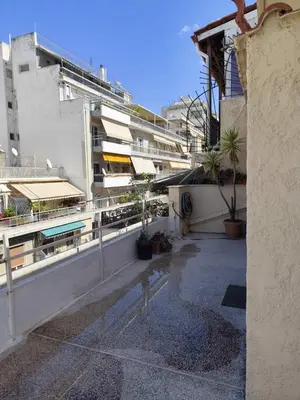 a view of a balcony of a building with buildings at Happy Rabbit 3 in Athens
