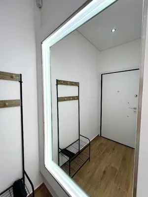 a large window in a room with a mirror at Casa Marina in Athens