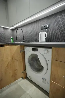 a washing machine in a kitchen with a sink at Cozy Exarcheia, 1 BDRM central Apartment in Athens