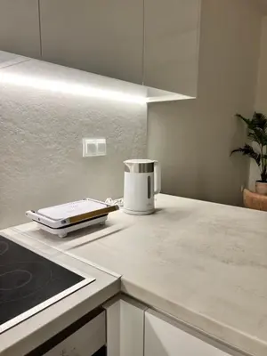 a kitchen counter with a toaster on top of it at Apartment Cathrine in Athens