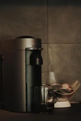 a coffee maker sitting next to a bowl of food at Luxury modern chic 1-bedroom apartment Athens City in Athens