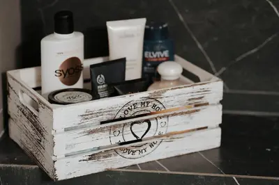 a wooden box with products on top of a counter at Luxury modern chic 1-bedroom apartment Athens City in Athens