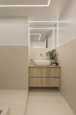 a bathroom with a sink and a mirror at Sci-Fi Themed Studio in Koukaki in Athens