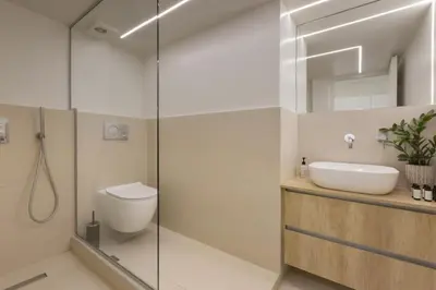 a bathroom with a shower and a toilet and a sink at Sci-Fi Themed Studio in Koukaki in Athens