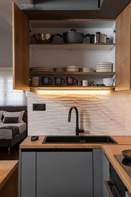 a kitchen with a sink and a counter top at Glyfada Luxury Suite by First Class Properties in Athens