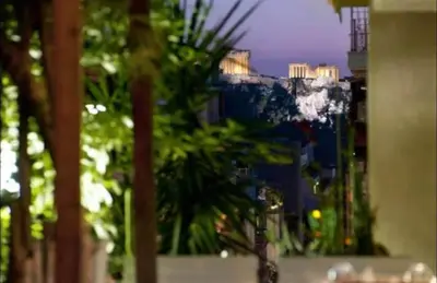 a view of a city with buildings in the background at Central Athenian Maison, with Acropolis Views in Athens