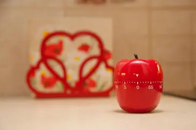 a red apple sitting on a table in front of a heart at Lovely Nest Piraeus Premium in Piraeus