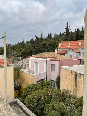 a group of buildings with trees in the background at Chillout in Athens in Athens
