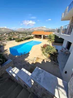an image of a swimming pool in a house at Bella Vista pool Villas in Anavissos in Barbaliáki