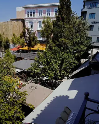 an overhead view of a city with buildings and trees at Luxurious loft in Monastiraki in Athens