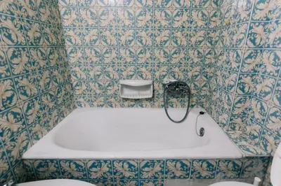 a bathroom with a bath tub and a toilet at Happy Rabbit 4 in Athens