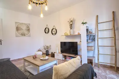 a living room with a couch and a table at ConEviKa in Athens
