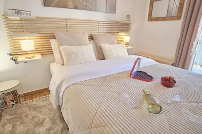 a bedroom with a bed with fruit on it at ConEviKa in Athens