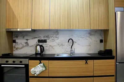 a kitchen with a sink and a counter top at Theo Apartments in Athens Center in Athens