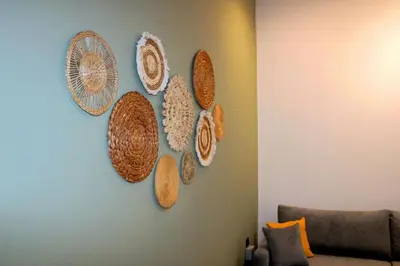 a wall with a bunch of plates on a wall at Theo Apartments in Athens Center in Athens