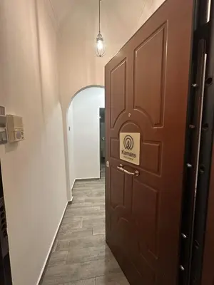 a door with a sign on it in a hallway at Kamara in Athens
