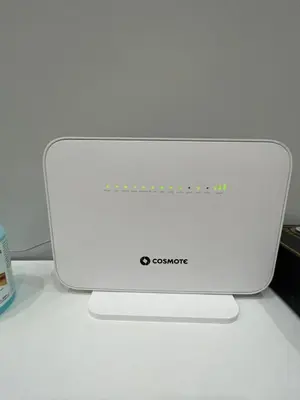 a white laptop computer sitting on top of a table at FilOikos Privacy Nest Retreat 3Br 3Ba En-Suite in Athens