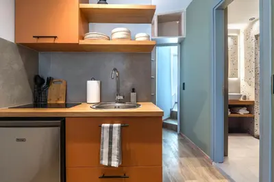 a kitchen with a sink and a counter at Blum Residence Athens in Athens