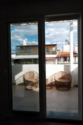 a view of a balcony from a window at Near Pireas Port-Brand New Suite in Athens