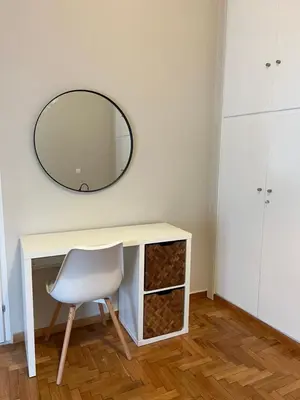 a white desk with a chair and a mirror at AK Athens Fine Stay - Penthouse with Big Terrace and View - 2 min from Metro in Athens
