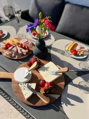 a table with plates of food on a table at AK Athens Fine Stay - Penthouse with Big Terrace and View - 2 min from Metro in Athens