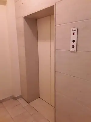 a door with a door knob in a room at Sunny apartment in the heart of Pireaus in Piraeus