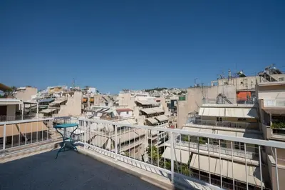 a view of a city from a balcony at Breezy Maisonette in Zea for 5 by Filos Inc in Piraeus