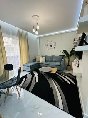 a living room with a couch and a zebra rug at Downtown Lux apartment in Athens