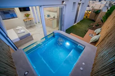 an overhead view of a swimming pool in a house at Paradise Heated Jacuzzi with Acropolis View in Athens