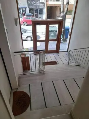 a view of a porch with stairs and a door at Artistic Elegance in central Athens, Pangrati in Athens