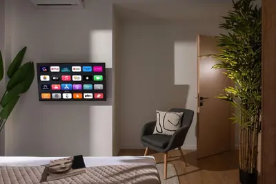 a room with an iphone hanging on the wall at Kaf23 - 2BR apt with Balcony in Athens