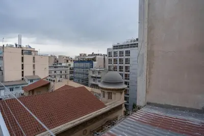 a view of the city from the roof of a building at The Athenian Penthouse in Syntagma Square in Athens