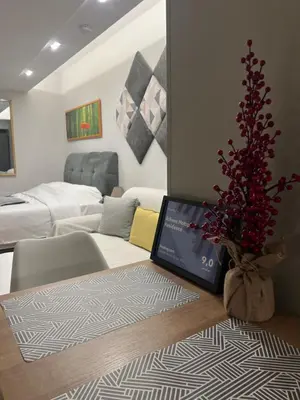 a living room with a couch and a table at Athens Hotspot Residence in Athens