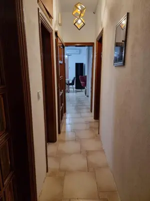 a hallway of a house with a tile floor at from Space to well-Designed COMFY in Piraeus