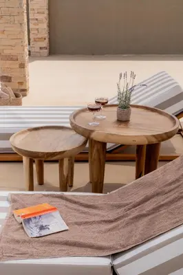 two wooden tables with glasses of wine on them at Villa Hyacinth by A&D Properties in Porto Rafti