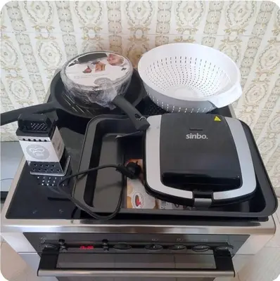 a kitchen appliance sitting on top of a refrigerator at Home away from home - 3BR - 14' walk to port in Piraeus