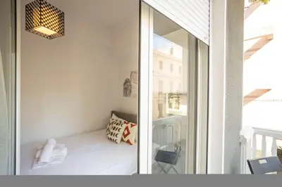 a small room with a bench in a window at Elegant 3-Bedroom Retreat in the Heart of Kolonaki in Athens