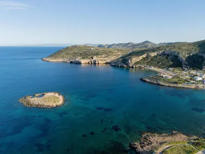 an aerial view of an island in the ocean at Elegant Coastal Retreat, Hot Tub and Sea Views By KB Hospitality in Dhaskalión