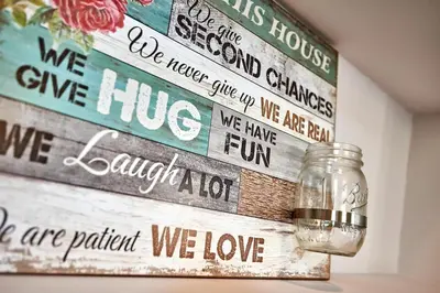 a wall art with a mason jar on it at Retro Elegant in Athens