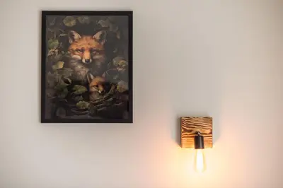 a painting of a fox and her cub on a wall at Platon At Philopappou By Greece Apartments in Athens
