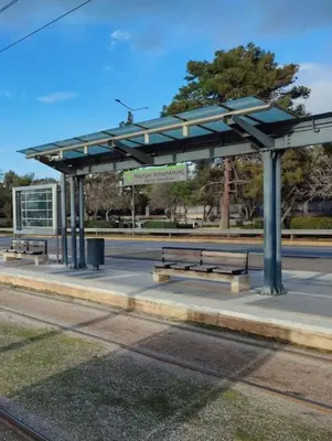 a bus stop with two benches at at Glyfada Sea Breeze Loft A in Athens